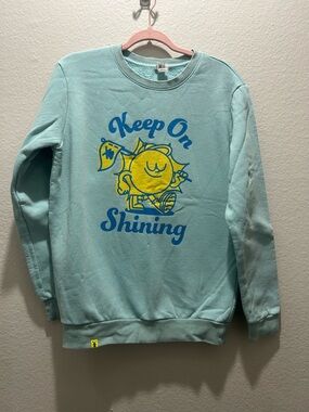 Dutch Bros Light Teal Crewneck Sweatshirt with Yellow & Blue Graphic